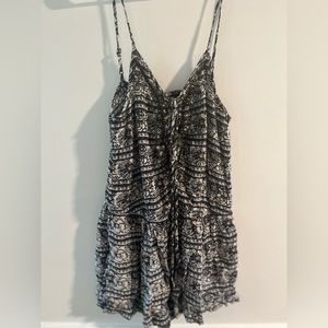 Romper with beading on the front and open back. only worn a couple times